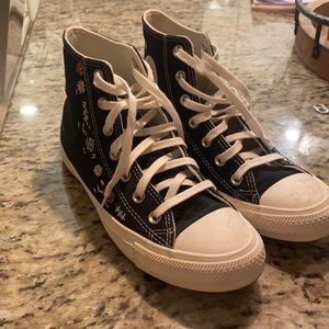 black embroidered converse high tops